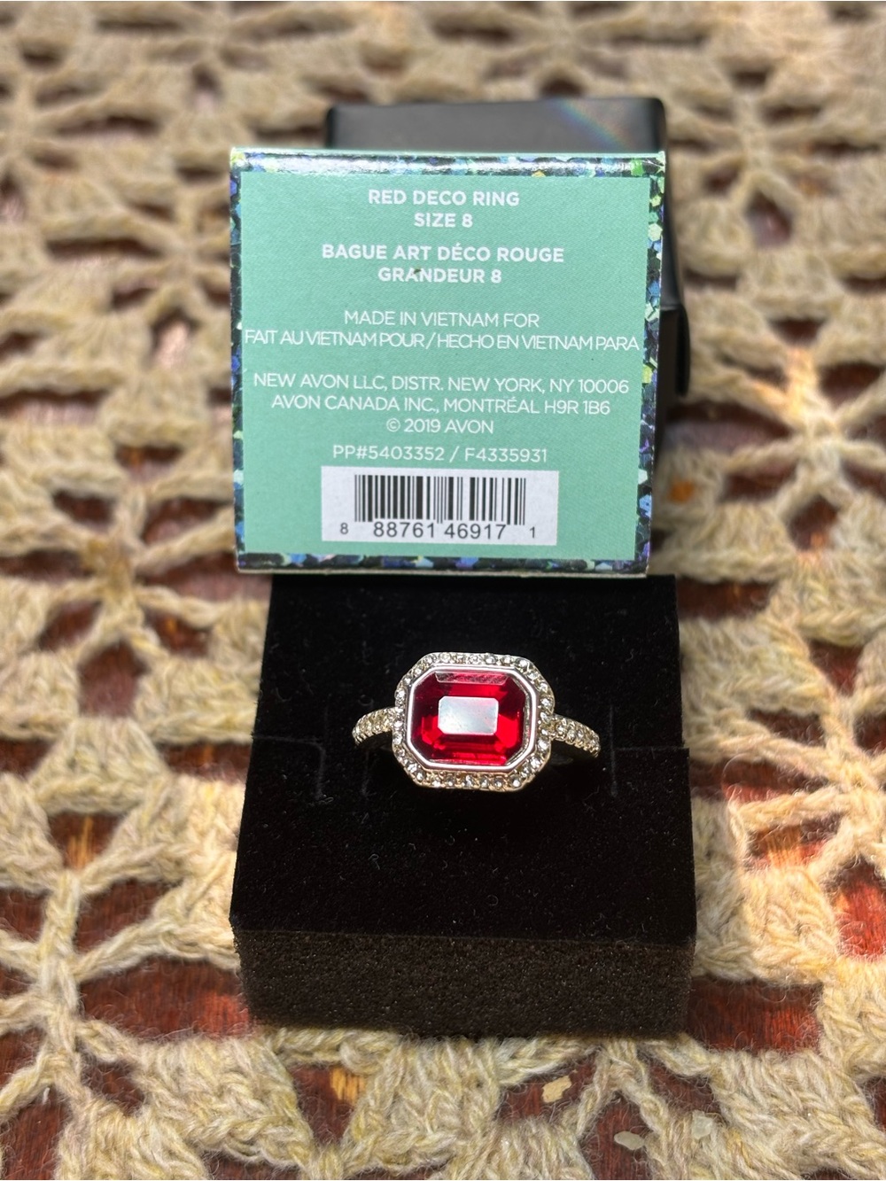 Avon Silver-Tone Ring with Deep Red Gem and Clear Halo